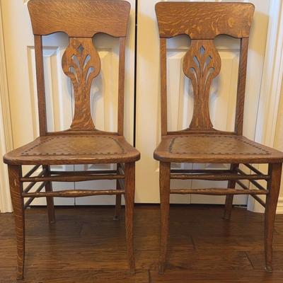 Pair of wooden, leather, studded seats 