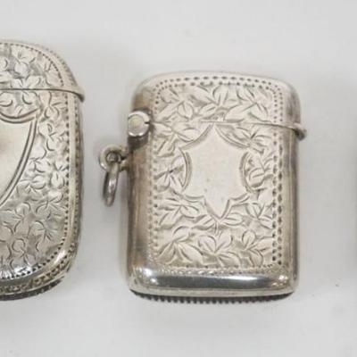 Sale Photo Thumbnail #211: 1211	GROUP OF 3 REPOUSSE STERLING MATCH SAFES, 1.3 OZT
