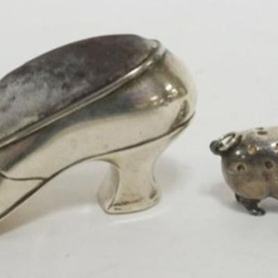 Sale Photo Thumbnail #221: 1221	STERLING SILVER SHOE AND PIG PIN CUSHION, 3.4 OZT TOTAL WEIGHT
