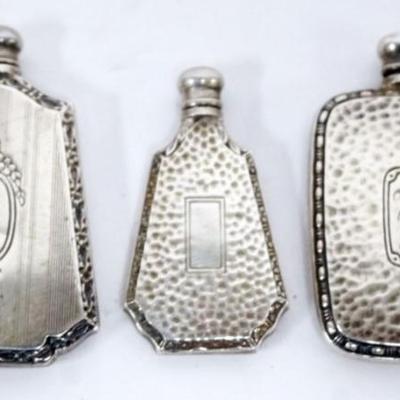 Sale Photo Thumbnail #181: 1181	3 STERLING SILVER SCENT PERFUME BOTTLES, TALLEST APPROXIMATELY 2 IN
