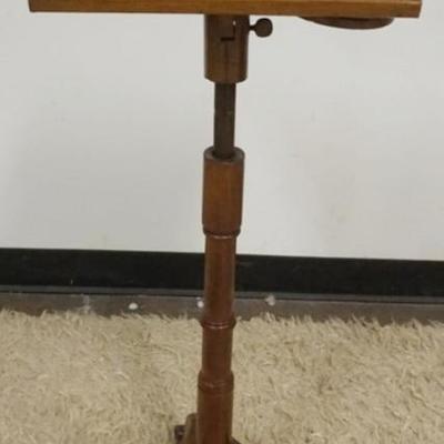 Sale Photo Thumbnail #241: 1241	ANTIQUE WALNUT ADJUSTABLE LECTURN APPROXIMATELY 13 IN X 10 IN X 36 IN
