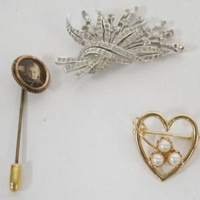 Sale Photo Thumbnail #133: 1133	ASSORTED JEWELRY INCLUDING PANETTA RHINESTONE PIN, PHOTO STICK PIN & HEART SHAPED PIN
