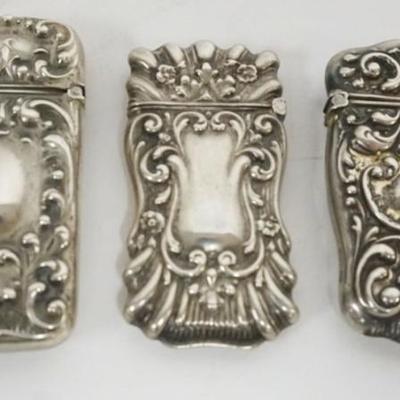 Sale Photo Thumbnail #209: 1209	GROUP OF 3 REPOUSSE STERLING MATCH SAFES, 1.4 OZT
