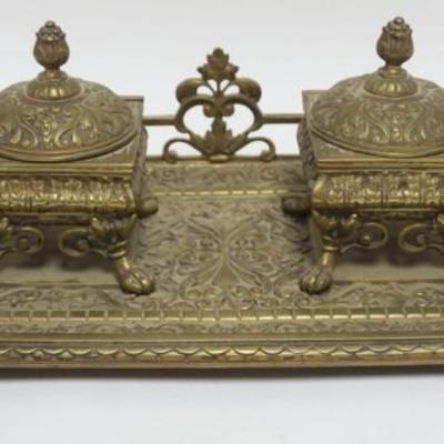 1017	ANTIQUE ORNATE BRASS DOUBLE INKWELL, APPROXIMATELY 13 IN X 8 IN X 5 IN HIGH
