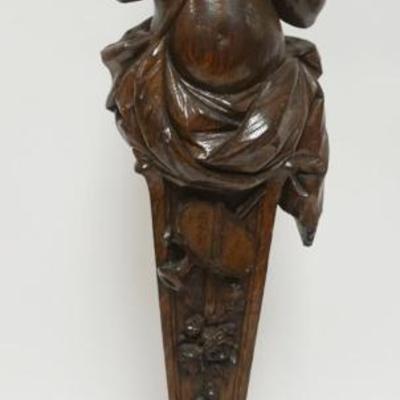 1022	CARVED OAK CHERUB PLAYING FLUTE

