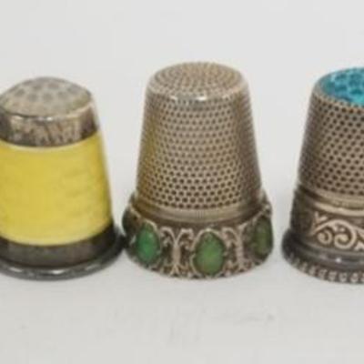 Sale Photo Thumbnail #218: 1218	7 STERLING THIMBLES, 1.1 OZT TOTAL WEIGHT
