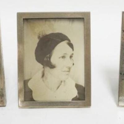 Sale Photo Thumbnail #230: 1230	3 STERLING SILVER FRAMES, LARGEST APPROXIMATELY 3 1/2 IN X 4 3/4 IN
