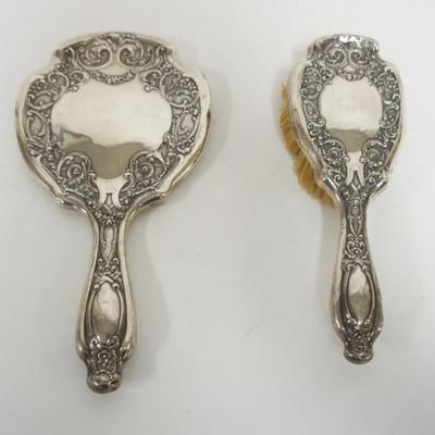Sale Photo Thumbnail #192: 1192	STERLING SILVER LADIES DRESSER MIRROR AND HAIR BRUSH
