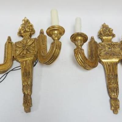 1050	PAIR OF NEOCLASSICAL GILT WOOD ELECTRIC CANDLE WALL SCONCES, EACH APPROXIMATELY 13 IN X 17 IN HIGH, MISSING ONE SOCKET SLEEVE
