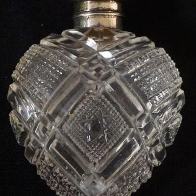 Sale Photo Thumbnail #172: 1172	HEART SHAPED CUT GLASS AND REPOUSSE STERLING LID LADIES SCENT PERFUME BOTTLE APPROXIMATELY 4 IN
