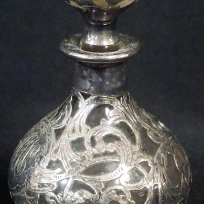 Sale Photo Thumbnail #157: 1157	ANTIQUE SILER OVERLAY TOOLED PERFUME BOTTLE, APPROXIMATELY 4 3/4 IN H
