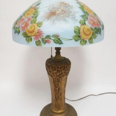 1032	ORNATE PARLOR LAMP W/CAST METAL FLORAL EMBOSSED BASE & SIGNED M RADDISH REVERSE PAINTED SHADE, APPROXIMATELY 25 IN HIGH
