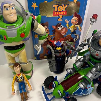 Sale Photo Thumbnail #45: Toy Story 2 Action Figures | Buzz Lightyear, Woody, Zurg & RC Car with Book