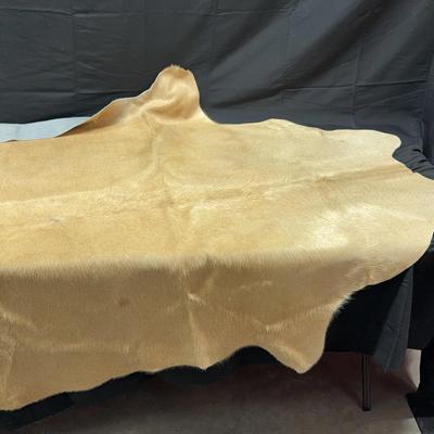Tan Cowhide Run