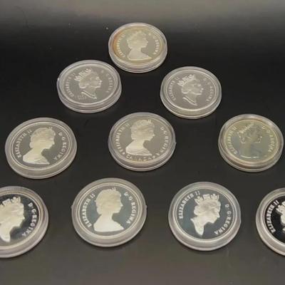 Royal Canadian Mint Sterling Dollars w/ Leather Portfolio Collection