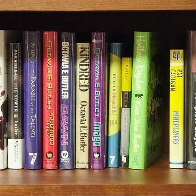 Collection of 26 Sci Fi Books Including Octavia E. Butler