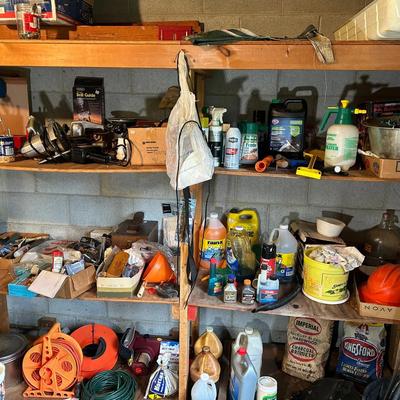 Tools And Contents Of Workshop Shelves 