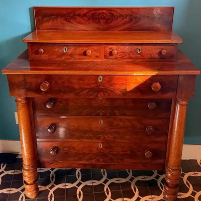 American empire style flame mahogany chest of drawers