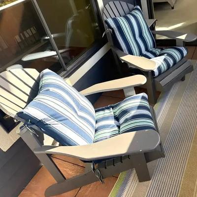 Two wood adirondack chairs