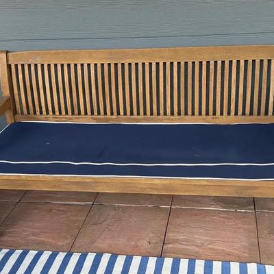 Wood patio bench with sunbrella pad