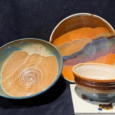 Hand thrown glazed stoneware pottery bowls including trivet