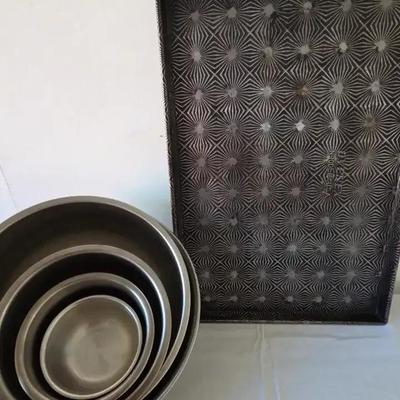 vintage Ovenex starburst baking pan With Stainless Mixing Bowls