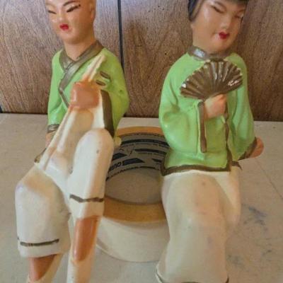 Vintage chalkware figurine of an Asian couple.