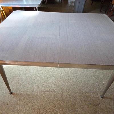 mid-century modern MCM Formica kitchen table with a Wood Grain Pattern With 2 Leaf Pieces
