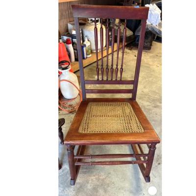 antique rocker with cane bottom $75
