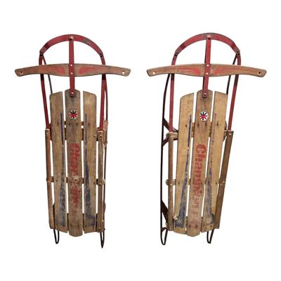 Two Vintage Champion Wood Sleighs