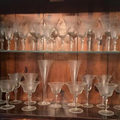 Delicate Etched Glassware Collection Featuring Champagne & Wine Glasses