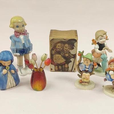Hummel and dutch style figurine collectibles