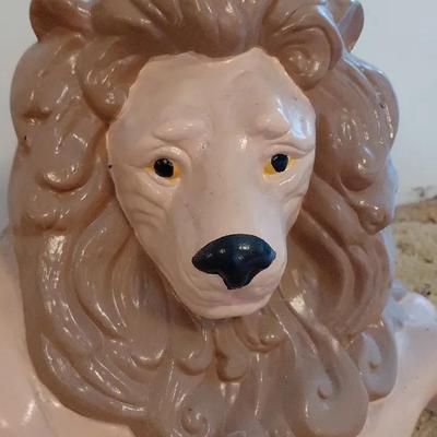 Reposing ceramic lion