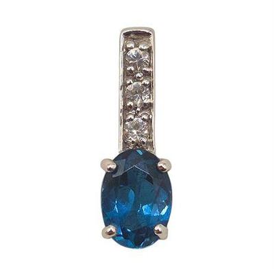 Lot 016   
14K White Gold Blue Sapphire Pendant