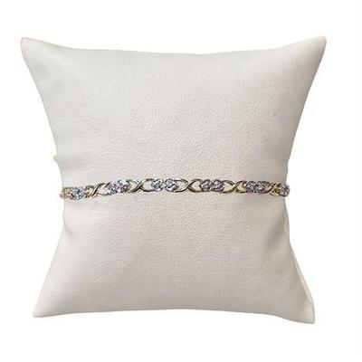 Lot 005   
10K Yellow & White Gold Heart Bracelet