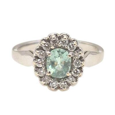 Lot 001  
18k White Gold Diamond Ring w/ Aquamarine Center Stone
