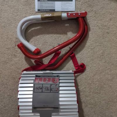 WST050 Escape Ladder by "Kidde" and an Unused Gigantic Cooking Spatula for Making Breakfast.