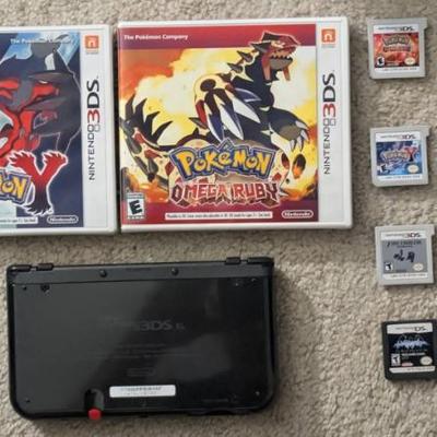 WST047 Mobile "Nintendo 3DS" with Games. Play them anywhere you go! (2) Unused "POKEMON" Games. 
