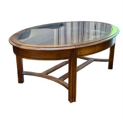 Lot 012   
Wood And Glass Oval Cocktail Table