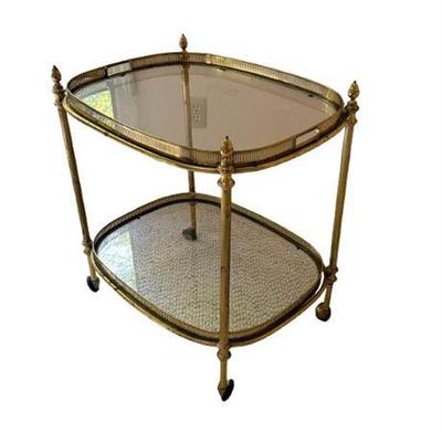 Lot 003  
Mid Century Two-Tiered Glass And Brass Rolling Serving Cart