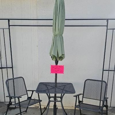 Table and chairs with umbrella now $37.50