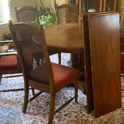 American Drew Pedestal Dining Table with Six Cane-Back Chairs and Two Leaves