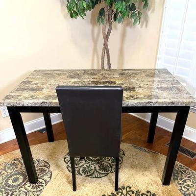 Faux marble table with two chairs