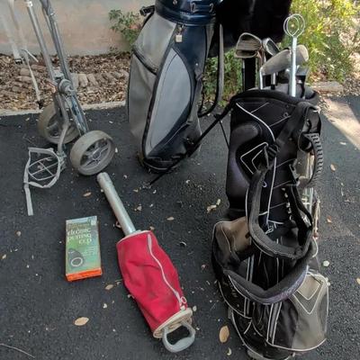 2 Sets Of Wilson Golf Clubs, Callaway Carrying Case, Spartan Automatic Cart & More