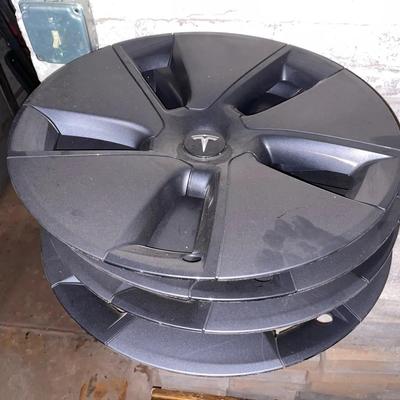 Four Plastic Tesla Hubcaps