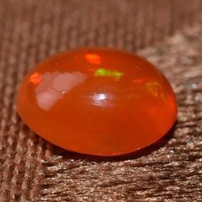 1.9 Carat Natural Oval Orange Opal Cabochon - AAA - Possibly Treated 