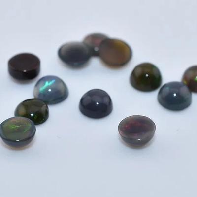 2.7 Carat Natural Round Black Opal Parcel - Possibly Treated