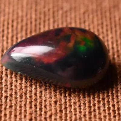 3.2 Carat Natural Pear Black Opal - AAA - Possibly Treated