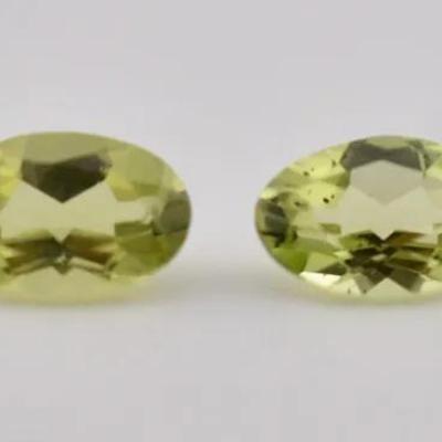 0.9 TCW Natural Unheated Oval Twin Peridots - VVS to IF