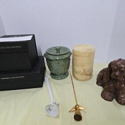 A Lot of Candle warmers, Sculpted Candles, and Candle Snuffers.